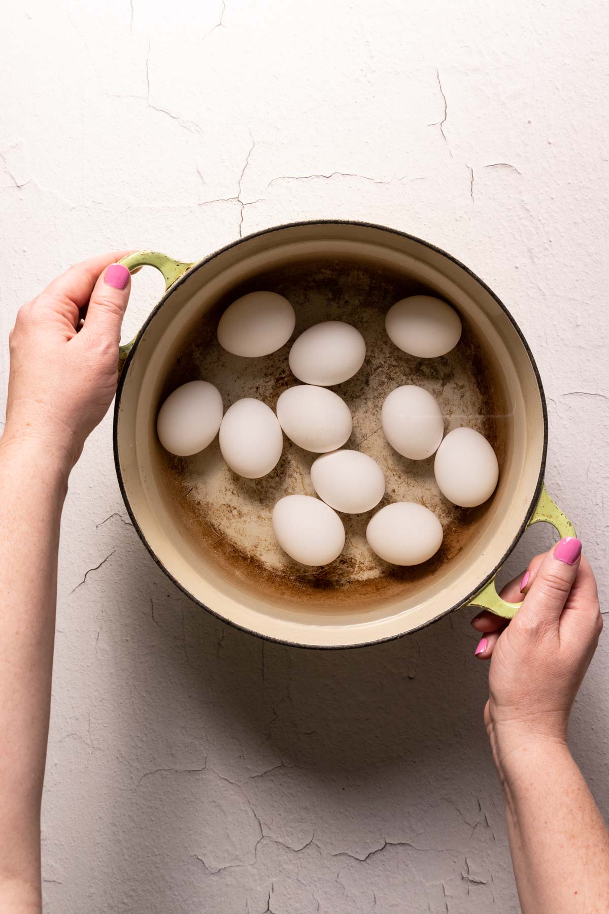 Eggs in a green pot with water