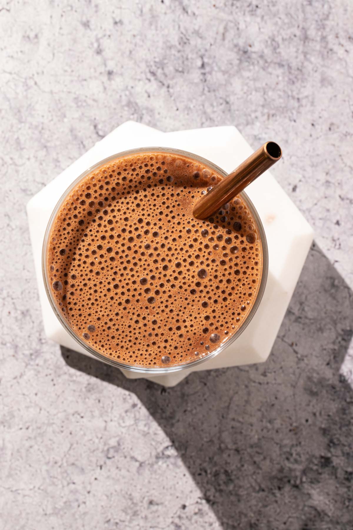 Bubbles on the surface of a coffee smoothie