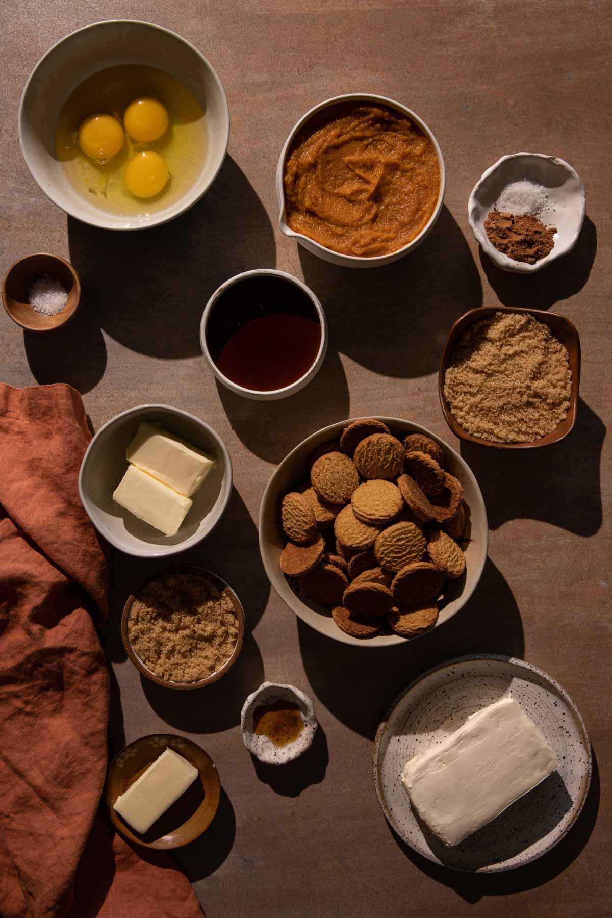 Bowls of ingredients for cream cheese pumpkin pie