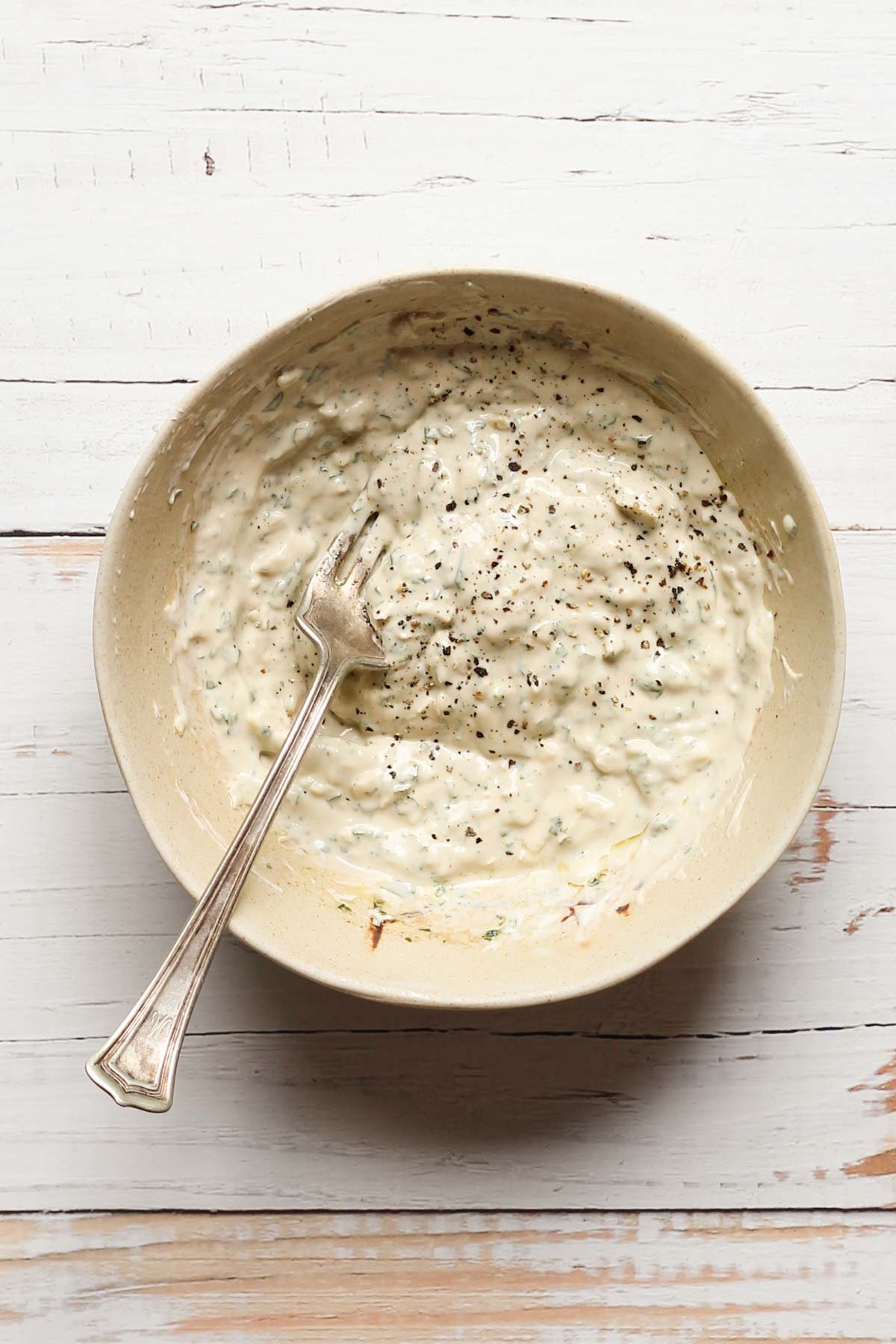 Healthy Caesar dressing mixed in a bowl