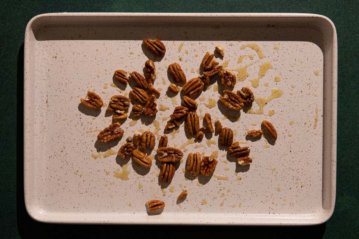 Toasted pecans on a sheet pan