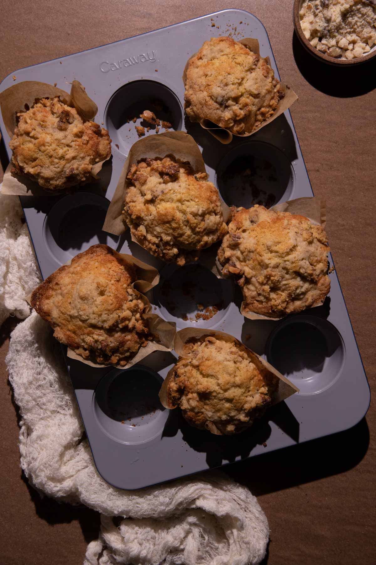 Banana walnut muffins baked in a muffin pan