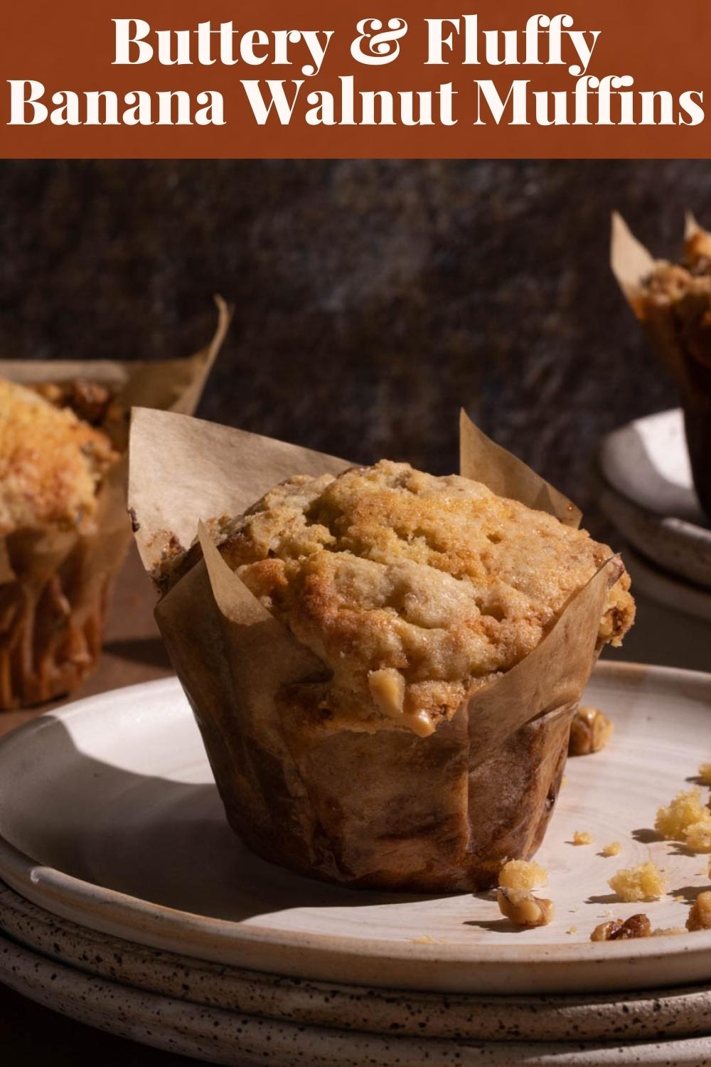 These fluffy and buttery Banana Walnut Muffins with a streusel topping are absolute perfection! via @bessiebakes