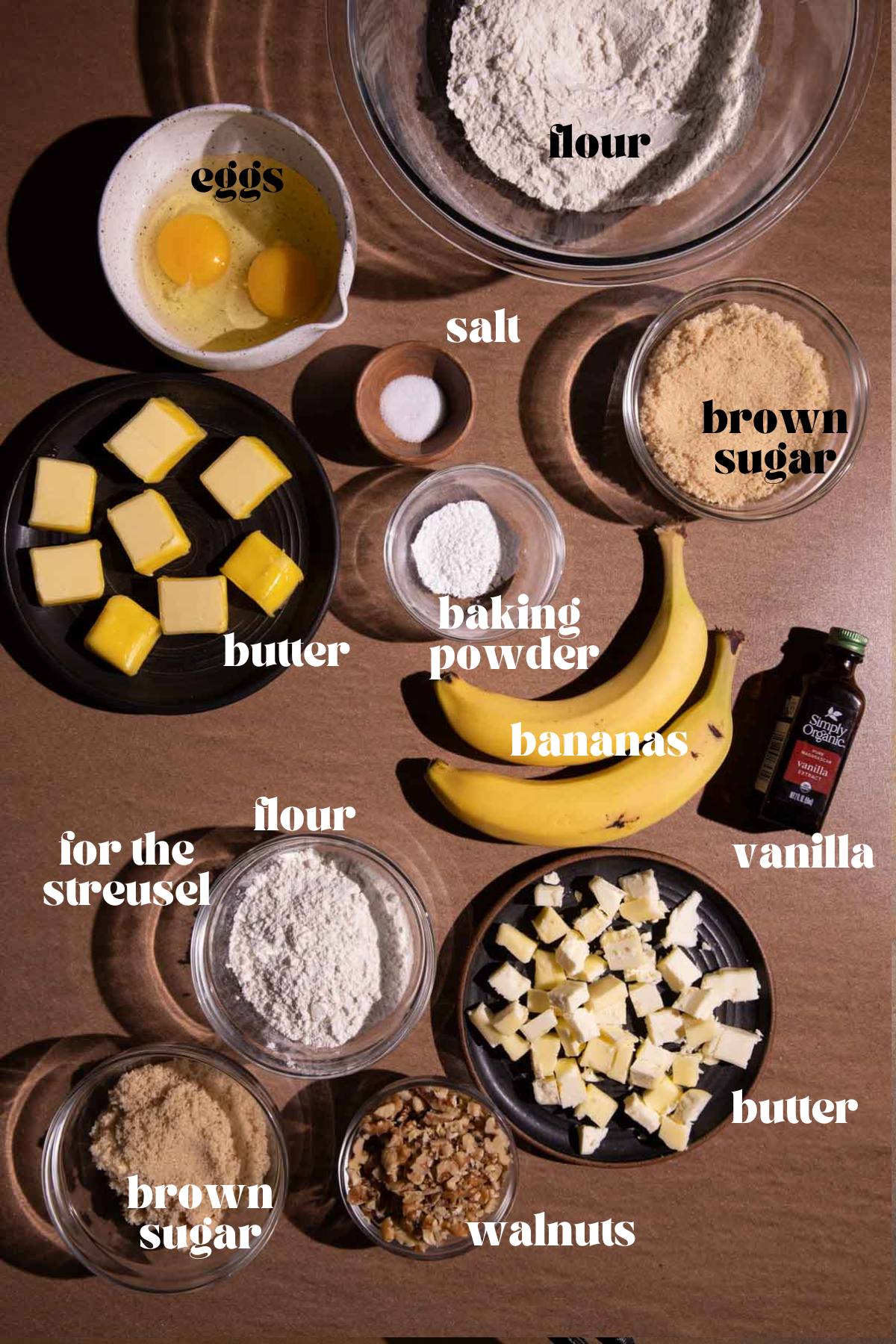 Banana walnut muffins ingredients in bowls and plates