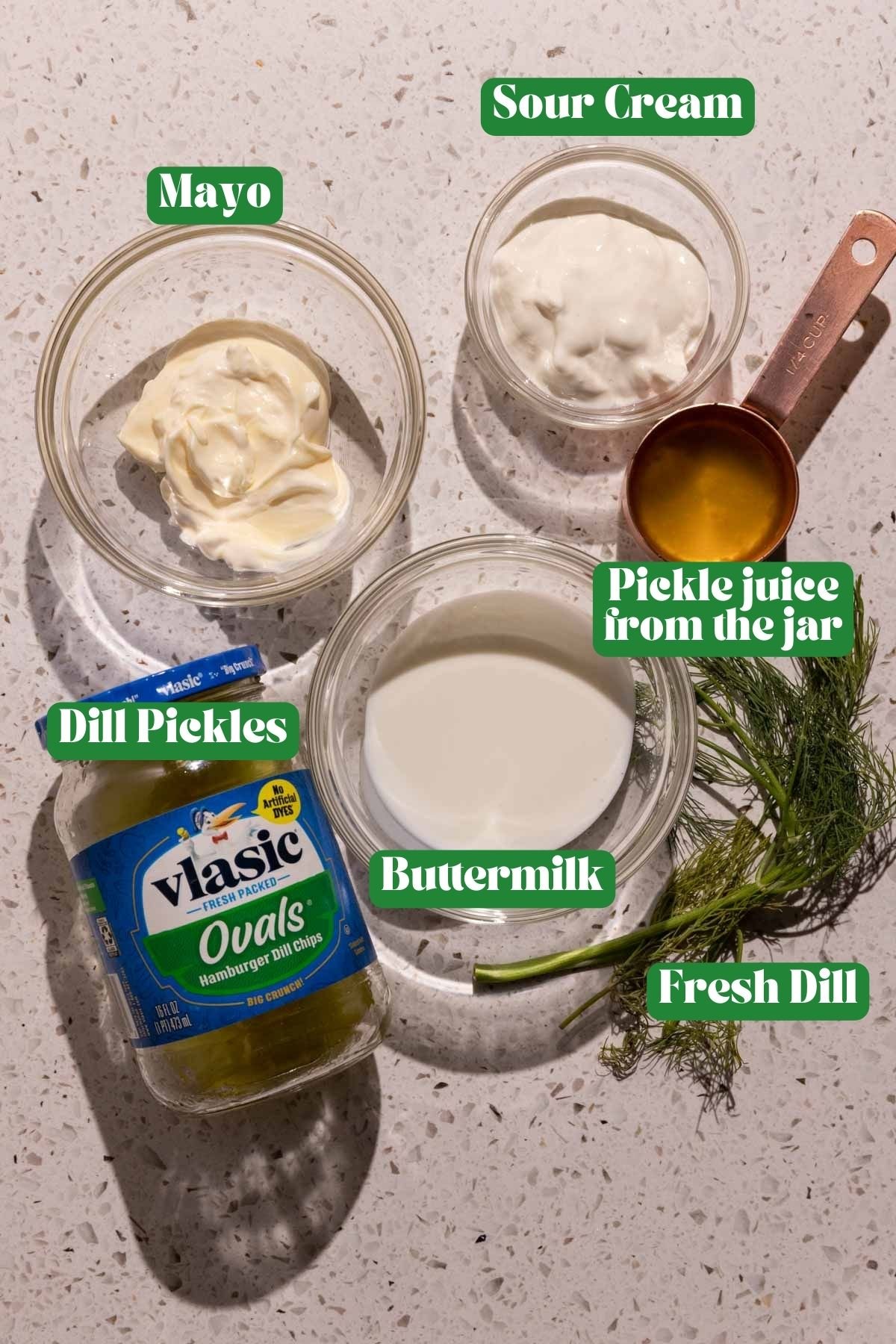 Dill pickle ranch dressing ingredients in bowls